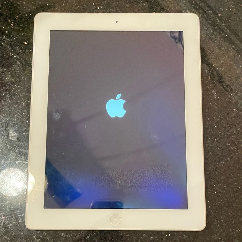 Silver ipad 4th Generation (Wi-Fi only) 64g (iPad only- no cable or plug)